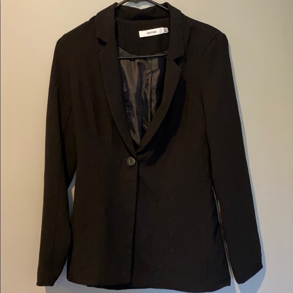 Black blazer with small shoulder pads